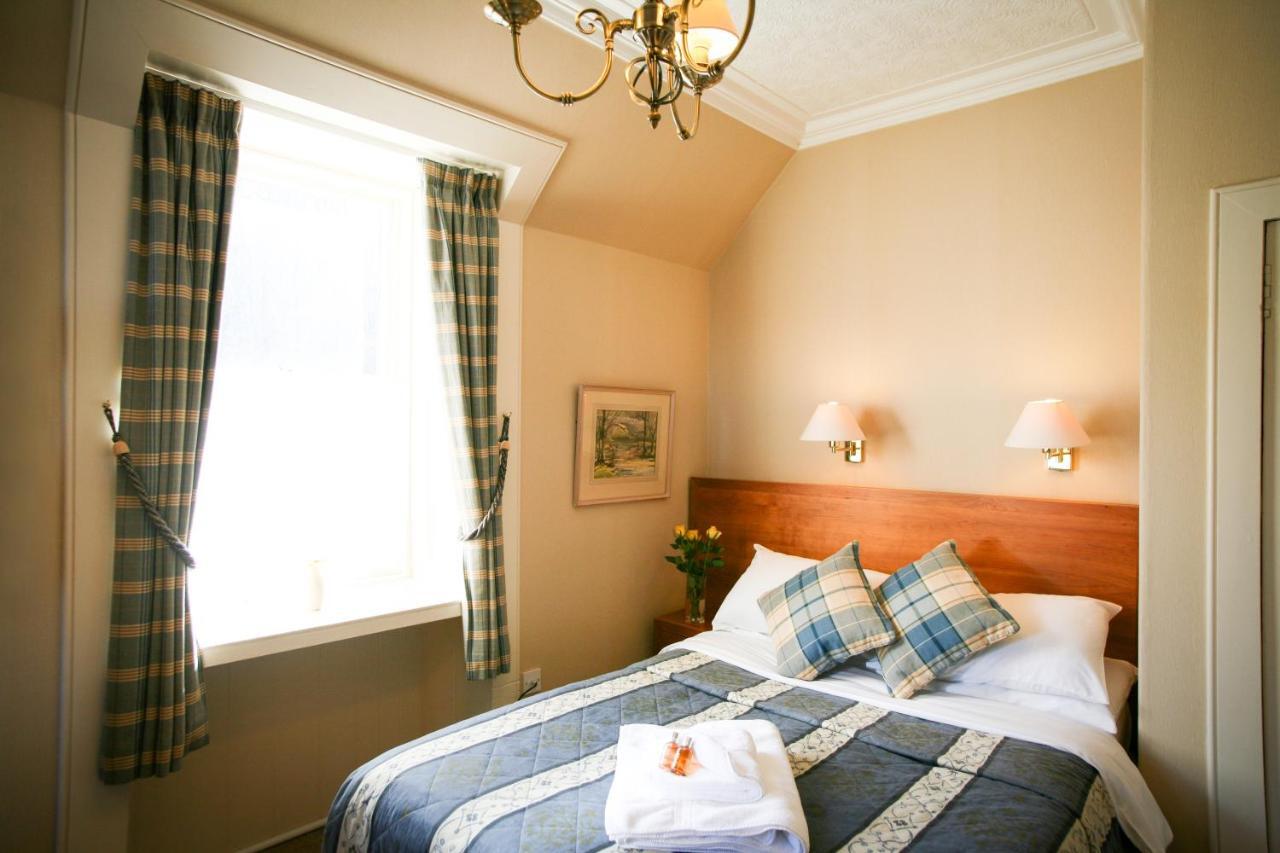 The Tomich Hotel Bagian luar foto