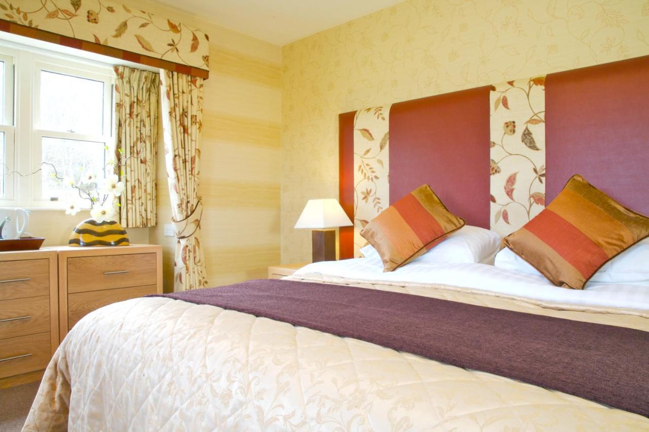The Tomich Hotel Bagian luar foto
