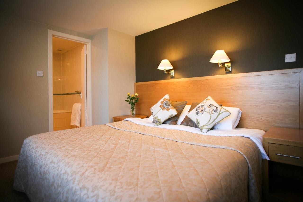 The Tomich Hotel Bagian luar foto